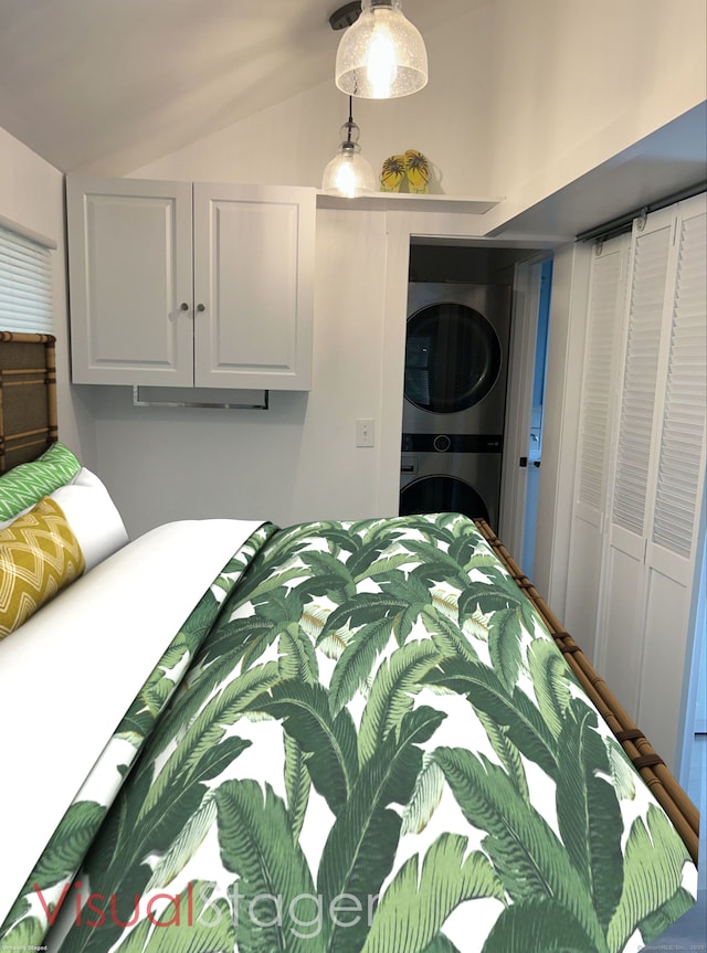 300 Mile Creek Rd, Old Lyme, CT 06371 - bedroom with estacked washer and dryer and vaulted ceiling