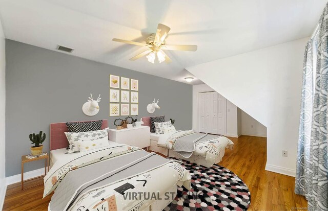 569 Lake Winnemaug Rd, Watertown, CT 06795 - bedroom featuring baseboards, wood finished floors, visible vents, and a closet