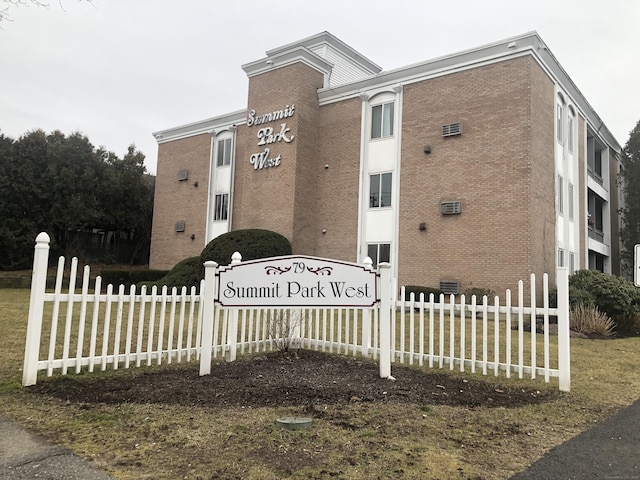 view of property featuring fence