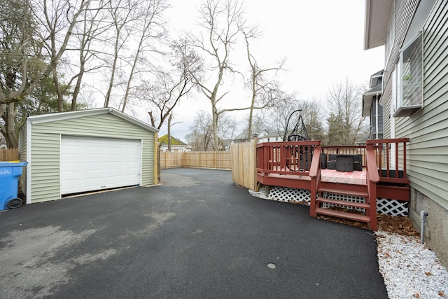 87 Englewood Ave, Waterbury, CT 06705 - detached garage featuring driveway and fence