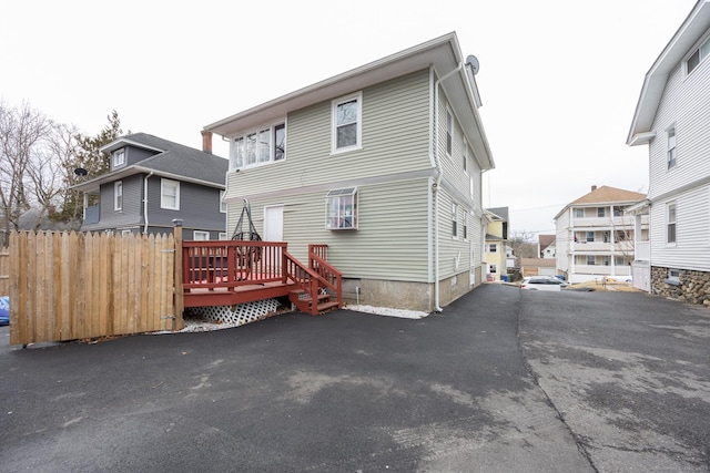 87 Englewood Ave, Waterbury, CT 06705 - back of property featuring a wooden deck and fence