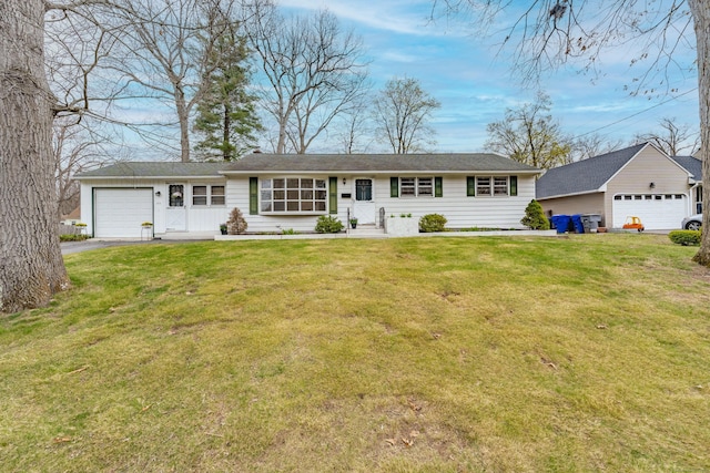 33 Wagon Rd, Enfield, CT 06082 - ranch-style house with aphalt driveway, a front yard, and a garage
