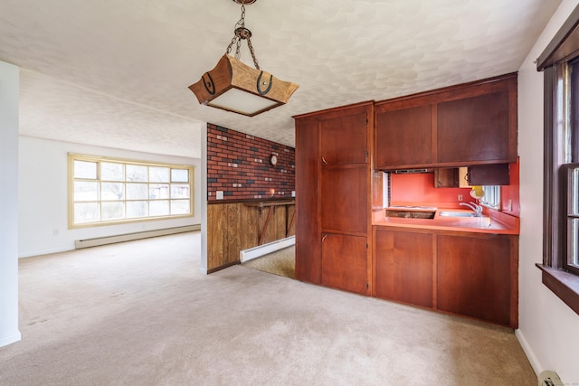 33 Wagon Rd, Enfield, CT 06082 - kitchen with carpet, a sink, and a baseboard radiator
