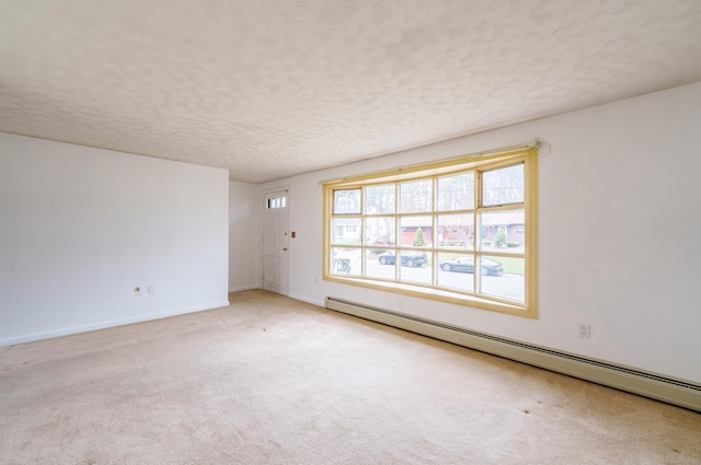 33 Wagon Rd, Enfield, CT 06082 - carpeted empty room featuring baseboards, a textured ceiling, and baseboard heating