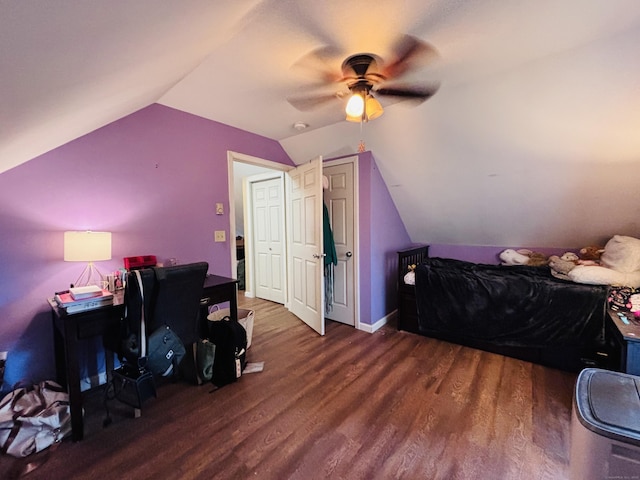 bedroom with vaulted ceiling, wood finished floors, and a ceiling fan