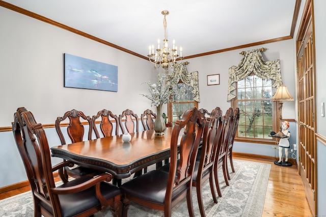 3 Huntington Ln, New Fairfield, CT 06812 - dining space with a chandelier, ornamental molding, baseboards, and light wood-style floors