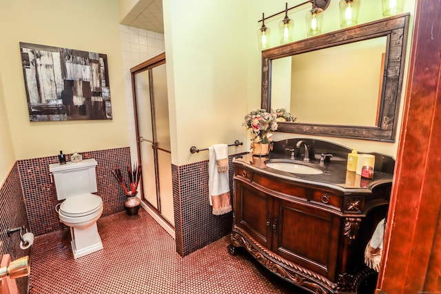 3 Huntington Ln, New Fairfield, CT 06812 - bathroom with toilet, a shower stall, a wainscoted wall, vanity, and tile walls