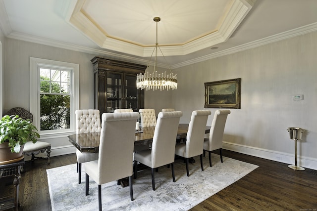 17 Wardwell Dr, New Canaan, CT 06840 - dining room with wood finished floors, a chandelier, a raised ceiling, crown molding, and baseboards