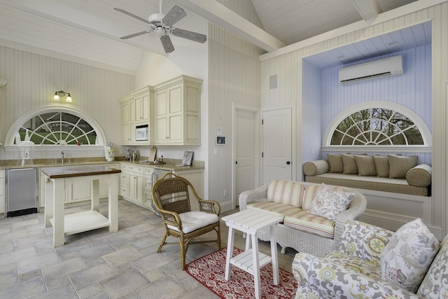 17 Wardwell Dr, New Canaan, CT 06840 - living room with a wall unit AC, light stone finish flooring, ceiling fan, and wooden walls