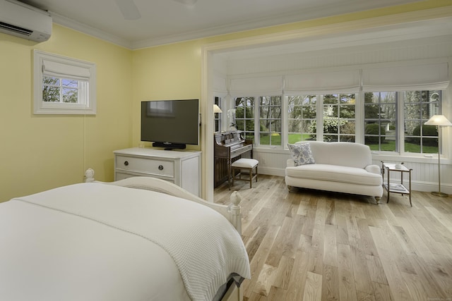 17 Wardwell Dr, New Canaan, CT 06840 - bedroom featuring a wall mounted air conditioner, light wood-style floors, ornamental molding, ceiling fan, and baseboards