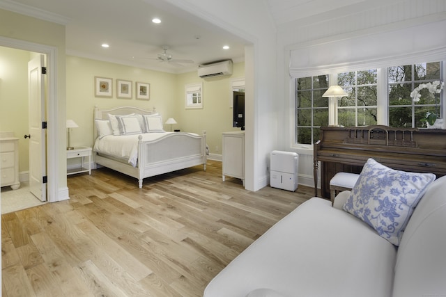 17 Wardwell Dr, New Canaan, CT 06840 - bedroom featuring an AC wall unit, recessed lighting, light wood-style flooring, baseboards, and ensuite bathroom
