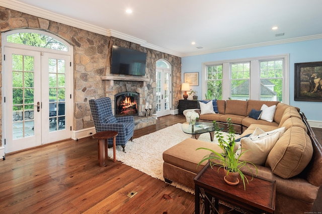17 Wardwell Dr, New Canaan, CT 06840 - living room featuring hardwood / wood-style flooring, ornamental molding, a fireplace, french doors, and recessed lighting