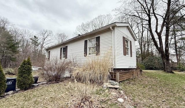 44 Red Bridge Rd, Thompson, CT 06255 - view of home's exterior with a yard