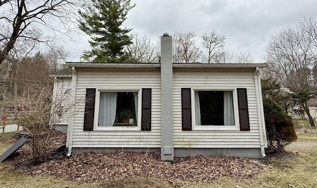 44 Red Bridge Rd, Thompson, CT 06255 - view of side of home with a chimney