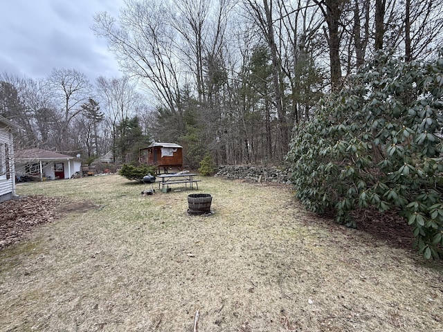 44 Red Bridge Rd, Thompson, CT 06255 - view of yard with an outdoor fire pit and an outdoor structure