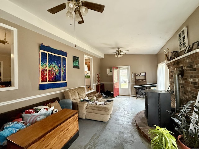 44 Red Bridge Rd, Thompson, CT 06255 - living room featuring ceiling fan, unfinished concrete flooring, and a wood stove