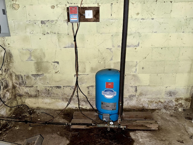 44 Red Bridge Rd, Thompson, CT 06255 - basement view of a water pressure tank, concrete block wall, and electric panel