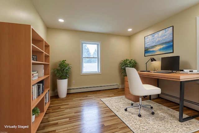 office with baseboard heating, recessed lighting, and wood finished floors