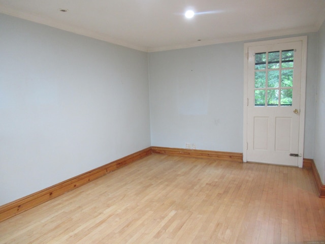 164 Flanders St, Bridgeport, CT 06604 - empty room featuring wood finished floors, baseboards, ornamental molding, and recessed lighting
