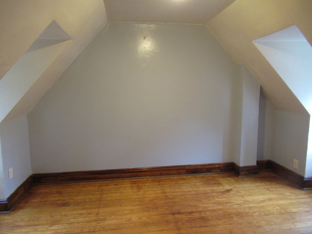 164 Flanders St, Bridgeport, CT 06604 - additional living space with light wood-style floors and vaulted ceiling