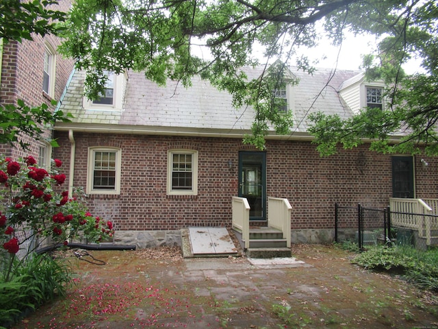 164 Flanders St, Bridgeport, CT 06604 - rear view of property with brick siding