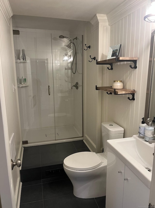 90 Bentwood Rd, West Hartford, CT 06107 - bathroom with tile patterned floors, vanity, a stall shower, and toilet