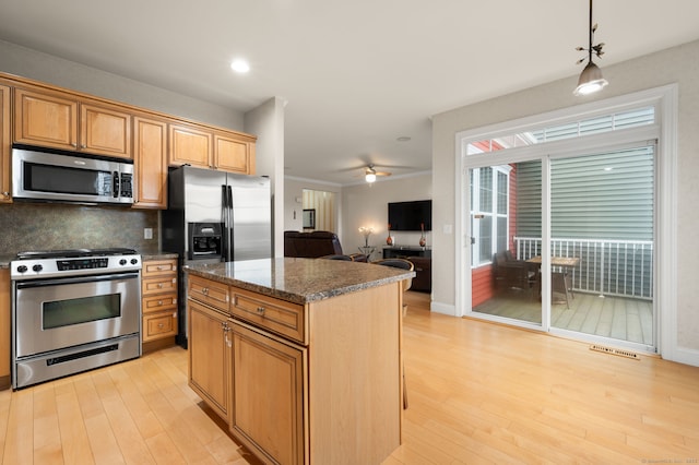 19 Mill Rd Unit 19, Danbury, CT 06810 - kitchen featuring tasteful backsplash, light wood-style flooring, visible vents, and appliances with stainless steel finishes