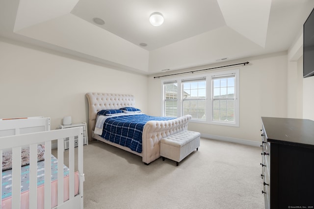 19 Mill Rd Unit 19, Danbury, CT 06810 - bedroom with baseboards, light carpet, and a raised ceiling