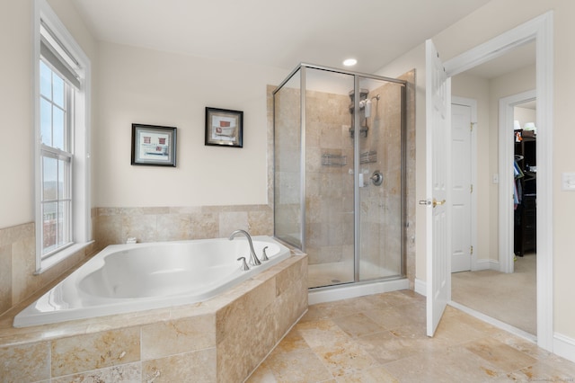 19 Mill Rd Unit 19, Danbury, CT 06810 - full bath featuring a bath, baseboards, a shower stall, and a walk in closet