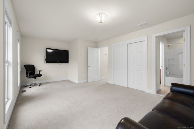 19 Mill Rd Unit 19, Danbury, CT 06810 - living area with visible vents, baseboards, and light carpet