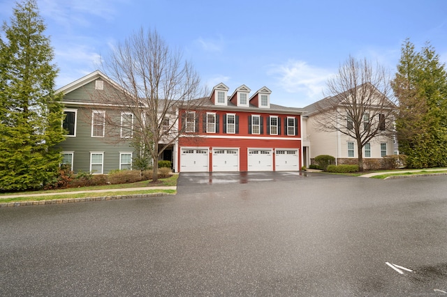 19 Mill Rd Unit 19, Danbury, CT 06810 - view of front of property featuring driveway and a garage