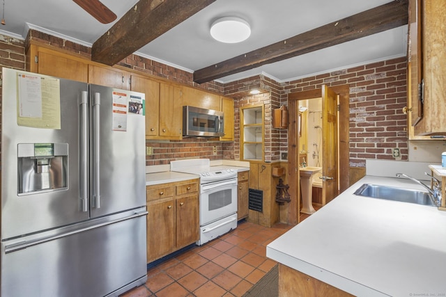200 New Canaan Ave, Norwalk, CT 06850 - kitchen with a sink, beam ceiling, light countertops, dark tile patterned floors, and appliances with stainless steel finishes