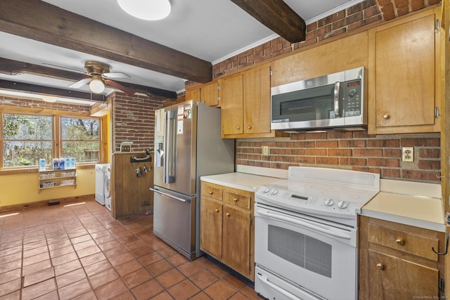200 New Canaan Ave, Norwalk, CT 06850 - kitchen with light countertops, beamed ceiling, washer and dryer, decorative backsplash, and appliances with stainless steel finishes