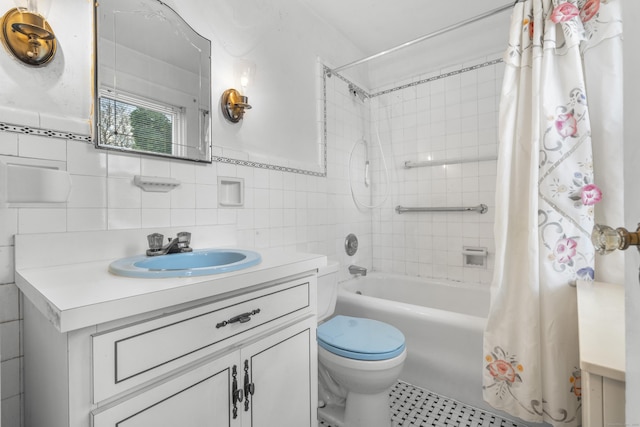 90 Culloden Rd, Stamford, CT 06902 - full bath with toilet, vanity, tile walls, and shower / tub combo
