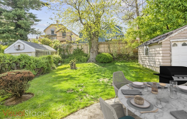 90 Culloden Rd, Stamford, CT 06902 - view of yard featuring a patio area, an outbuilding, and fence