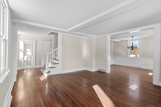 189 Derby Ave, Orange, CT 06477 - spare room featuring a chandelier, stairway, dark wood-type flooring, and ornamental molding