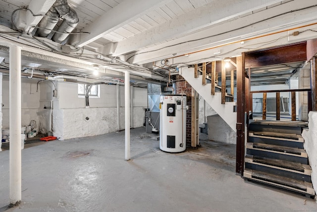 basement with stairs and water heater