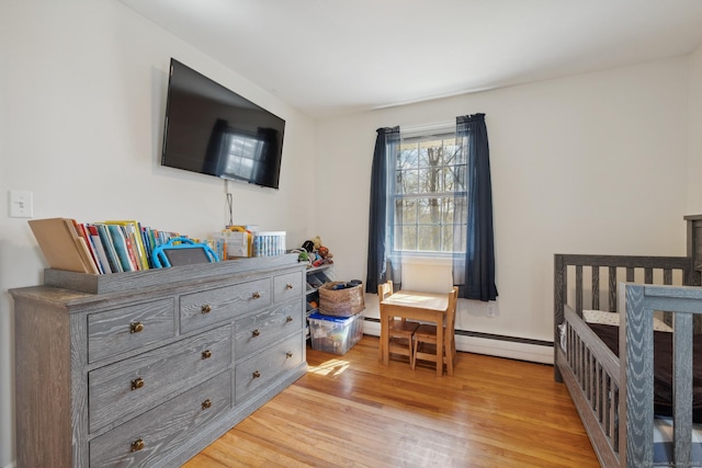 bedroom with light wood-style flooring