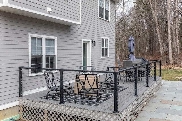 deck with outdoor dining space