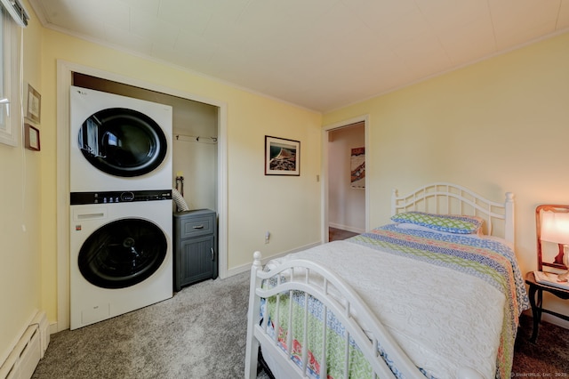 bedroom featuring stacked washer and clothes dryer, a baseboard heating unit, light carpet, and ornamental molding