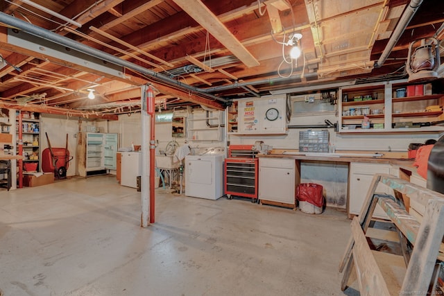 unfinished basement with washer and dryer