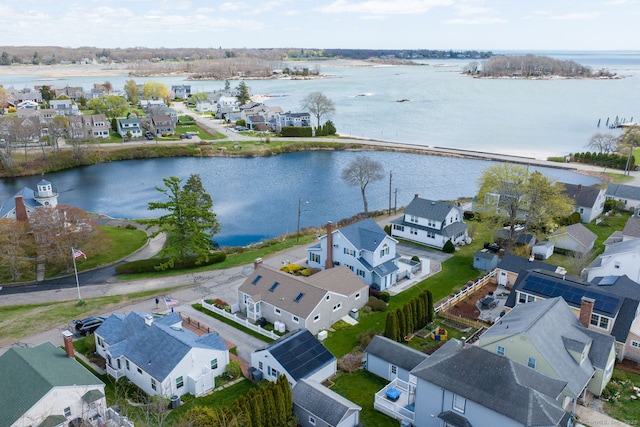 aerial view featuring a water view and a residential view