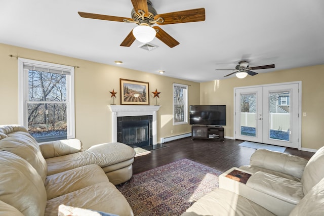 5 Ridge Ln, Shelton, CT 06484 - living room with visible vents, a ceiling fan, baseboard heating, and a healthy amount of sunlight