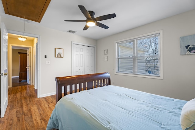 5 Ridge Ln, Shelton, CT 06484 - bedroom with visible vents, a closet, wood finished floors, baseboards, and attic access