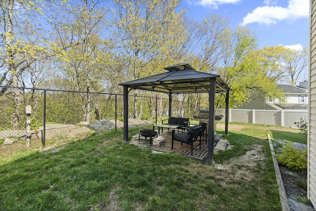 5 Ridge Ln, Shelton, CT 06484 - view of yard with a fenced backyard, a gazebo, a fire pit, and a patio area