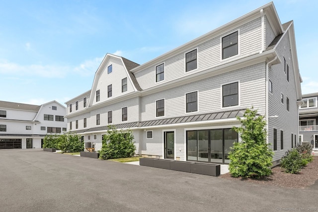 345 Reef Rd Unit B6, Fairfield, CT 06824 - view of front of house with a standing seam roof and a metal roof