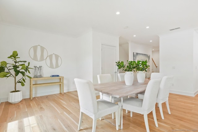 345 Reef Rd Unit B6, Fairfield, CT 06824 - dining area with light wood-style floors, stairs, recessed lighting, and ornamental molding