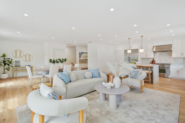 345 Reef Rd Unit B6, Fairfield, CT 06824 - living room featuring light wood-style floors and recessed lighting