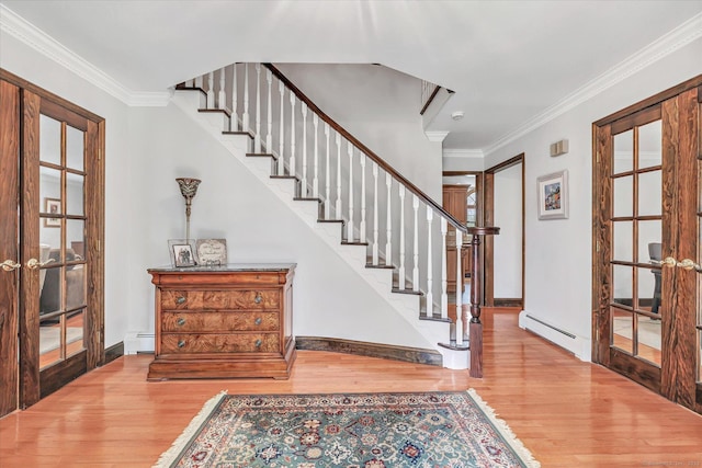 70 Cali Dr, Shelton, CT 06484 - foyer featuring a baseboard radiator, wood finished floors, and french doors