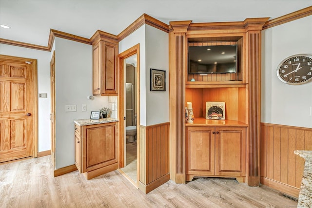 70 Cali Dr, Shelton, CT 06484 - bar with crown molding, a wainscoted wall, wood walls, and light wood-style flooring